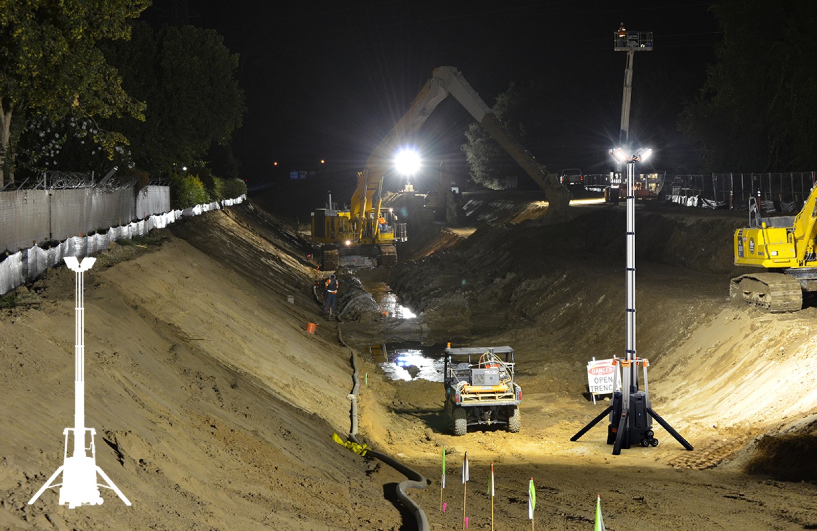 LI-500 light tower deployed at a night construction trench site