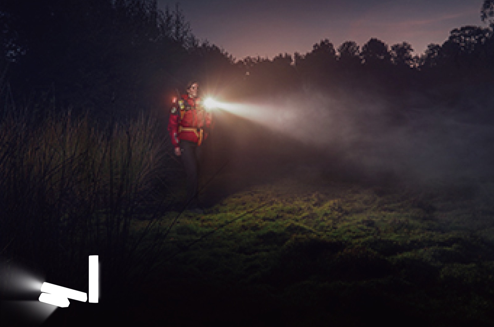 LI-S3 flashlight used by a rescue worker in foggy conditions