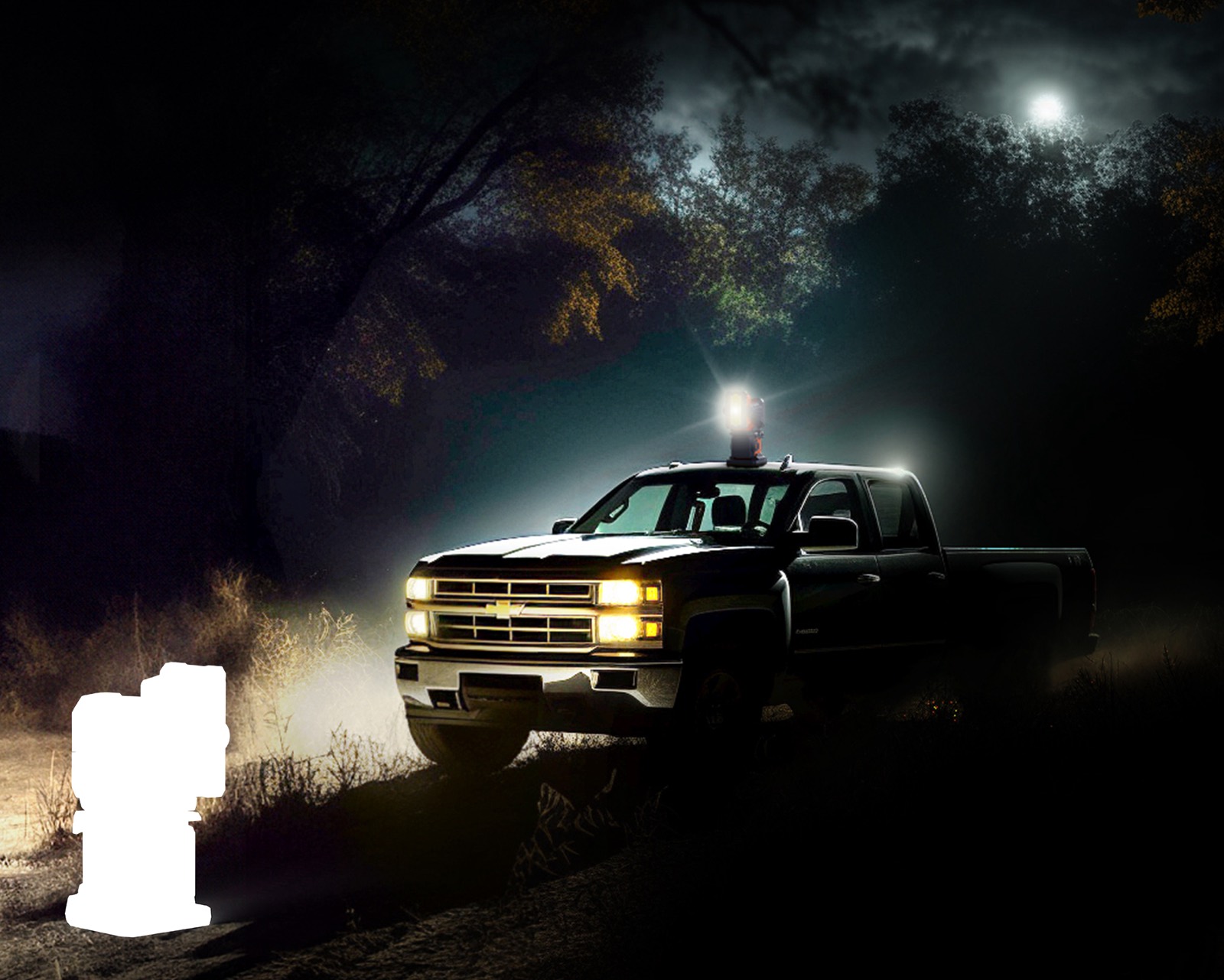 LI-TP-200 pan-tilt light magnetically mounted on a truck roof at night